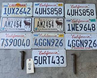 #2156 • 10 License Plates and 2 Railroad Spikes
