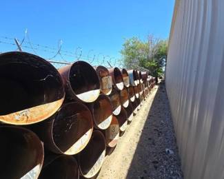 #3110 • Approx (75) 55 Gallon Drums with Pipe Fittings
