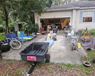 Please don't park on the driveway, because if you did, you'd probably run over a bunch of stuff. 
