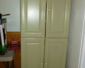 double-door green cabinet
