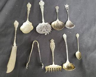 Lot # : 255 - Bag of sterling silver serving utensils
