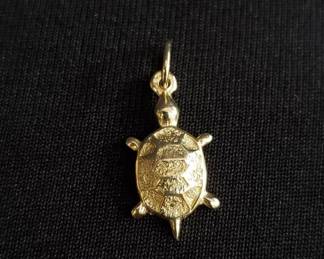 Lot # : 752 - Marked 14kt gold miniature turtle pendant 
