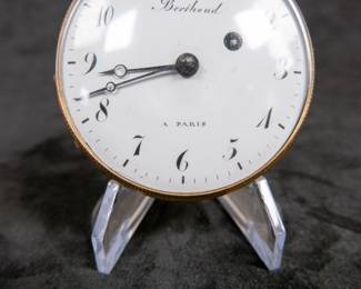 A 14k gold body pocket watch with an enamel face and Arabic numerals. Made by watchmaker Louis Berthoud of Paris in the early 1800's. This watch features a unique hidden erotic automaton scene on the back of the watch case. The face and back of the movement are both marker "Berthoud A PARIS". No key.