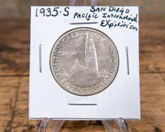 A 1935-S 50C San Diego commemorative half-dollar. Great coin details, estimated UNC condition.