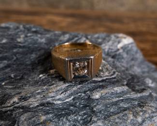 A men's 14k gold diamond ring with a single center set diamond. Made by Kaspar & Esh. Gold and diamonds have both been tested. Total weight 9.44 grams. Size 10.5