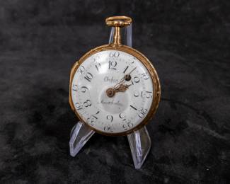 An 18K gold pocket watch with an enamel face with both hour and minute Arabic numerals. Made by watchmaker Carl Erick Orbin of Stockholm Sweden. Circa late 1700's. The back of the movement is engraved "Carl Er. Orbin", "Stockholm", and "No. 188". No key.