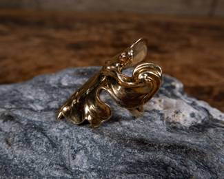 A 14k gold art nouveau ring depicting a winged lady, Loïe Fuller. The mold for the gold Art Nouveau ring is housed at the Maryhill Museum. Loïe Fuller (1863–1928) was a pioneer of modern dance and at the beginning of the 20th century, her influence impacted and inspired a new generation of dancers. Fuller’s circle of friends included artists, politicians, and European royalty, and it was she who convinced Sam Hill to turn his unfinished Maryhill mansion into a museum showcasing French fine art. The Loïe Fuller exhibition includes Art Nouveau posters, photographs, art glass and memorabilia from her 35-year career as a performer. Total weight 15.02 grams. Size 7.