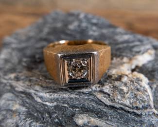 A men's 14k gold diamond ring with a single center set diamond. Made by Kaspar & Esh. Gold and diamonds have both been tested. Total weight 9.44 grams. Size 10.5