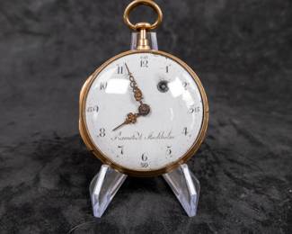 An 18k gold pocket watch with an enameled face and Arabic numerals. Made by watchmaker Pehr Ramstedt of Stockholm Sweden. Circa 1780's. The back of the movement has a jeweled center and is engraved with the makers information as well as "No. 54". No key.