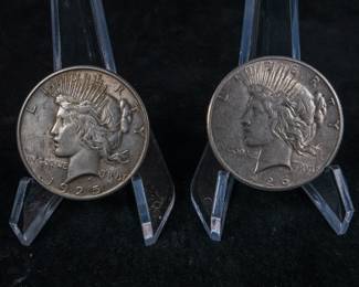 1925 Peace Dollar in XF condition minted in Philadelphia, and a 1926 S Peace Dollar in XF condition minted in San Francisco.
