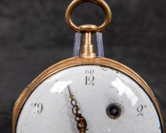 An 18k gold pocket watch with an enameled face and Arabic numerals. Made by watchmaker Pehr Ramstedt of Stockholm Sweden. Circa 1780's. The back of the movement has a jeweled center and is engraved with the makers information as well as "No. 54". No key.