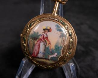 An 18K gold pocket watch with an enamel face and both Roman and Arabic numerals, and an artistic enamel back. Made by watchmaker Jean Romilly circa 1780-1790. The face and back of the movement are both inscribed "Romilly A PARIS"