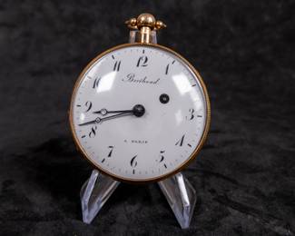A 14k gold body pocket watch with an enamel face and Arabic numerals. Made by watchmaker Louis Berthoud of Paris in the early 1800's. This watch features a unique hidden erotic automaton scene on the back of the watch case. The face and back of the movement are both marker "Berthoud A PARIS". No key.