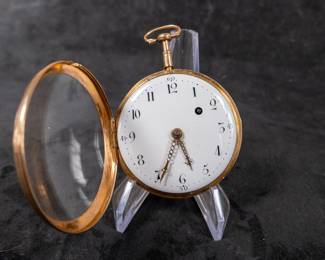 An 18k gold pocket watch with an enamel face and Arabic numerals. Originating from Sweden. Unknown maker. Circa early 19th Century. No key.
