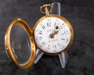An 18K gold pocket watch with an enamel face with both hour and minute Arabic numerals. Made by watchmaker Carl Erick Orbin of Stockholm Sweden. Circa late 1700's. The back of the movement is engraved "Carl Er. Orbin", "Stockholm", and "No. 188". No key.
