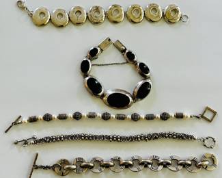 Silver bracelets, including vintage Lisa Jenks (bottom)