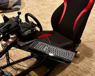 The gaming system is sold as a set: Alienware gaming PC, Oculus, chair, rig, and controls. 