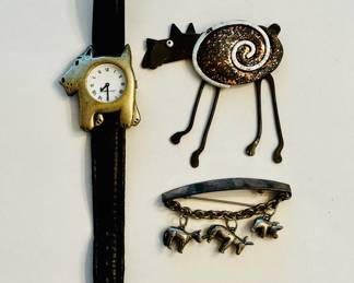 Susan Cummings sterling silver brooch (lower R)