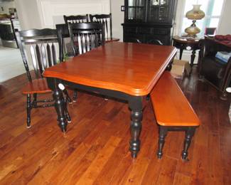 Dining table with 4 chairs (plus 1) and bench.  Also includes a leaf.