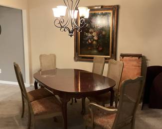 Dining room table and 6 chairs. Large oil painting. 
