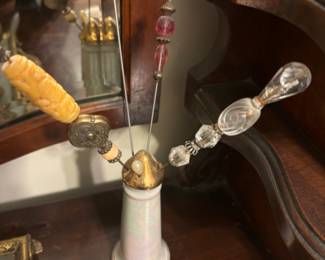 Hat pins and holder. 