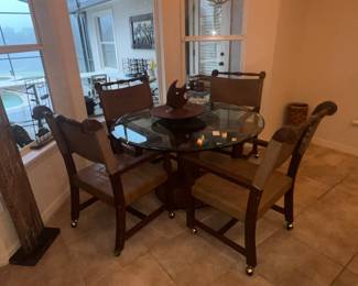 Available for pre-sale now. Glass top dinette set with four chairs $65.00. Call 407-590-8471 to view/purchase.