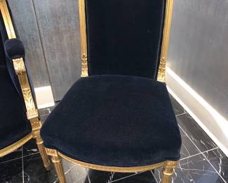 Velvet upholstered chair and matching settee