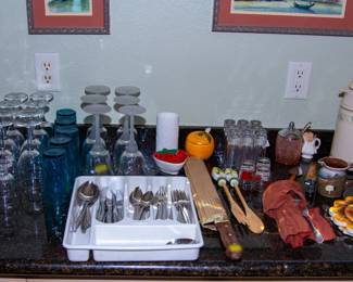 Assortment of glasses and kitchen utensils 