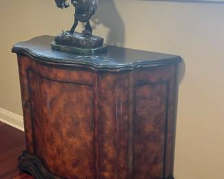 RALPH LAUREN Marble top console/cabinet holding a Frederic Remington bronze.  