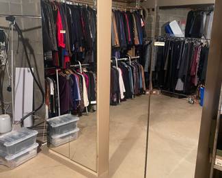 Two glass-front free-standing cabinets