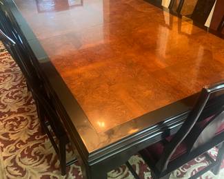 Chin Hua  black lacquer and burled wood table w/two leaves, pads and six chairs by Century