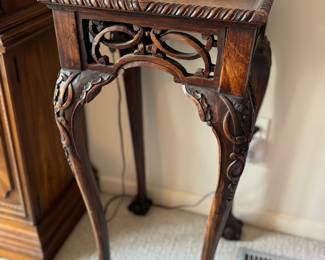 Elegant claw foot antique table