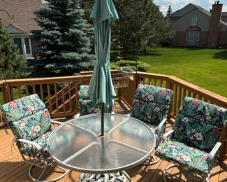 Nice patio set with swivel rockers 