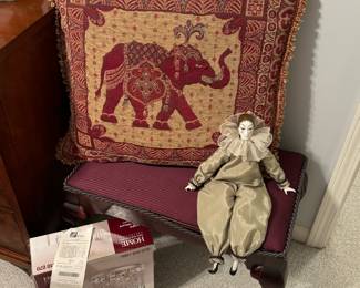 Beautiful accent pillow, chandelier 