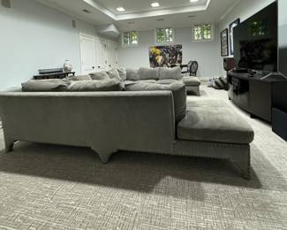 Three-Piece Moleskin Grey Upholstered Sectional Sofa with Contrasting Moleskin Grey Herringbone Fabric on Middle Section. Left Section Measures 116" x Middle Section Measures 154" x Right Section Measures 116". Photo 3 of 8.