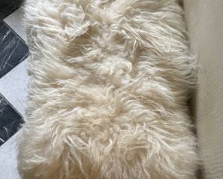 Mongolian Lamb Fur Upholstered Bench with Hammered Gilt Metal Legs. Photo 2 of 3.