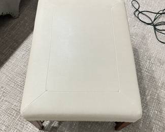 Baker Furniture Cocktail Table Upholstered In Textured Cream Faux Leather Fabric and Finished with Nailhead Trim. Measures 26" x 36" x 18.5" H. Photo 2 of 4.