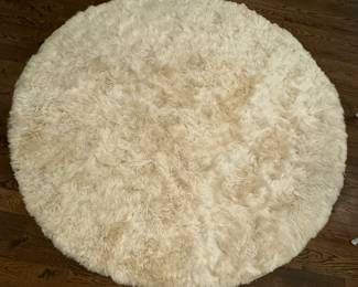 Plush Longhair Sheep Fur Rug with Liner. Measures 74" D. Photo 1 of 2.
