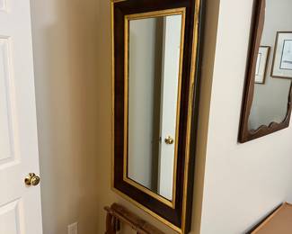 T176 - $75. Wall Mirror with Black & Gold Frame. Measures 24" x 45.5"