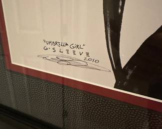 T180 - $30. "Umbrella Girl" Framed Print by David Gildersleeve. Measures 21.5" x 27.5"