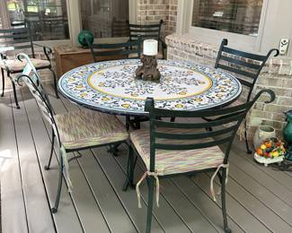 T23 - $2250. Domiziani Deruta '97. 51" Table top made from Volcanic Lavastone. 2 arm chairs - 4 side chairs. 