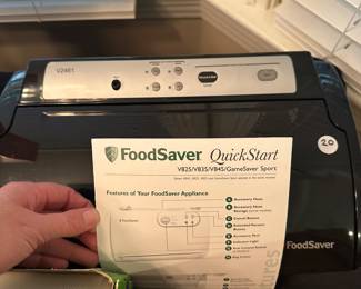 T125 - $20 FoodSaver model V2461. 