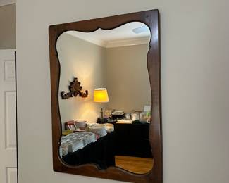 T175 - $25 wooden framed wall mirror. 