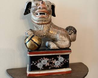 T16 - $60 Pair of Ceramic Foo Dogs. Measures 8" wide x 10" tall. 