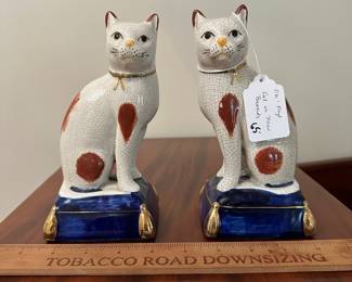 T79 - $65. Fitz & Floyd Cat on Pillow Bookends. Measures 7.5" tall. 
