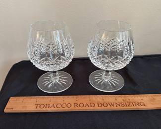 T104 - $45. Pair of Waterford Brandy Snifters. Measures 5.25" tall. 
