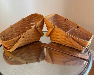 T124 - $25 each. Longaberger baskets with plastic trays. Signed. 