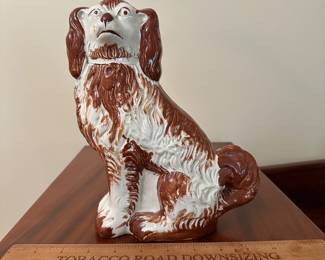 T80 - $40. Rust Colored Ceramic Dog. Measures 10" tall. 