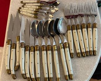 T110 - $75 - Jean Debost - Laguiole Ivory Color. 24 piece set of Flatware. 