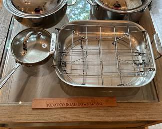 T144 - $40 All Clad Stainless Roaster with inserts. $30 Small Sauce Pan